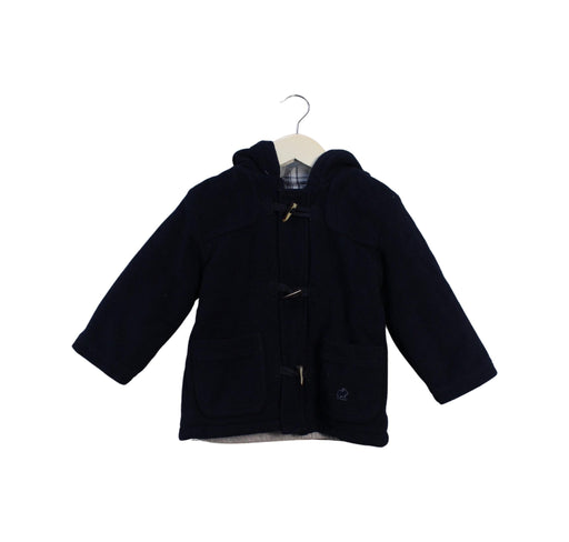 A Navy Coats from babycottons. in size 12-18M for girl. (Front View)