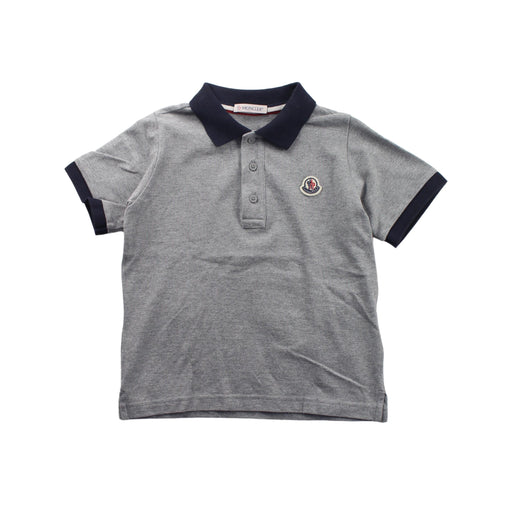 A Grey Short Sleeve Polos from Moncler in size 6T for boy. (Front View)