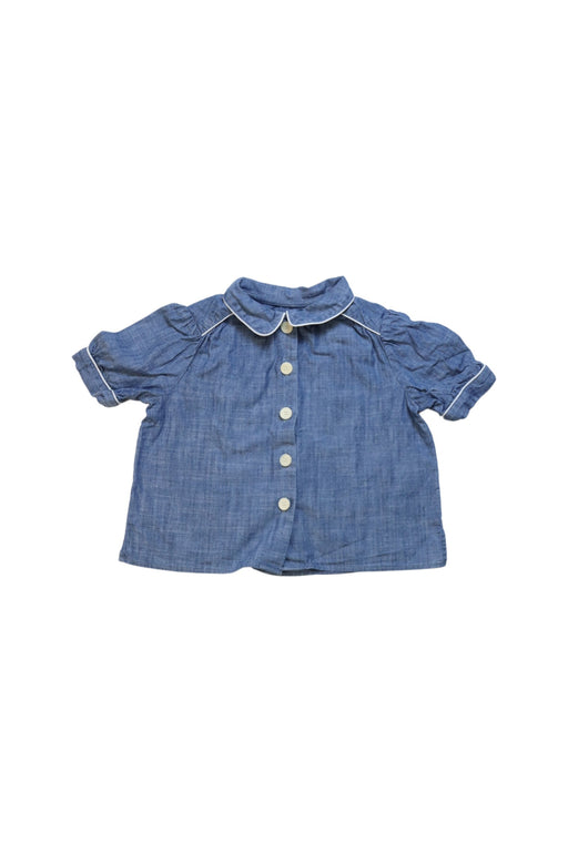 A Blue Short Sleeve Shirts from Bonpoint in size 4T for girl. (Front View)