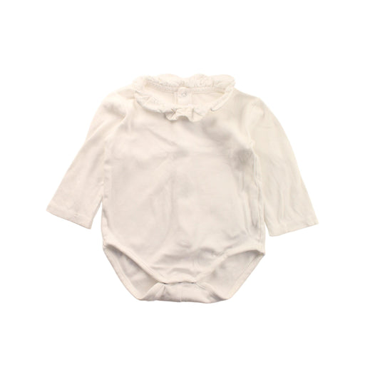 A White Long Sleeve Bodysuits from Mayoral in size 6-12M for girl. (Front View)