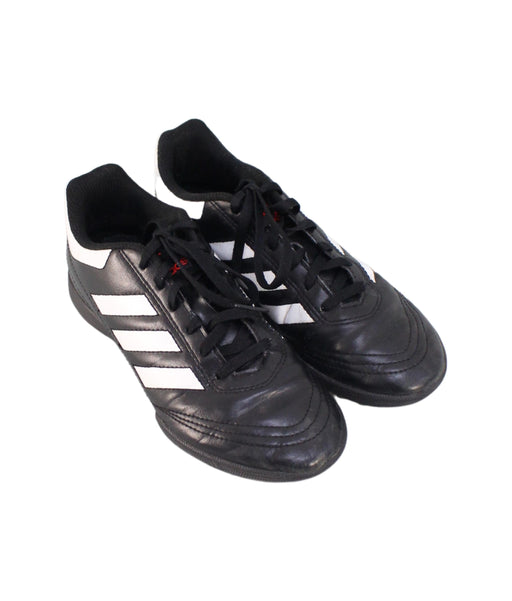 A Black Cleats/Soccer Shoes from Adidas in size 10Y for boy. (Front View)