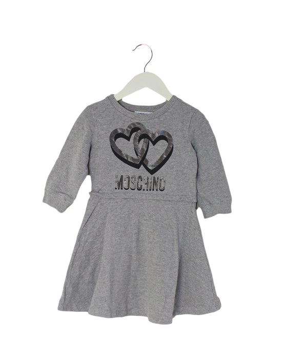 A Grey Sweater Dresses from Moschino in size 4T for girl. (Front View)