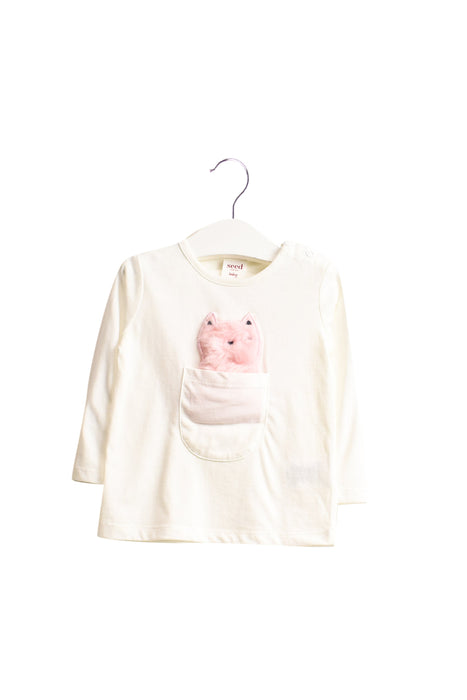 A White Long Sleeve Tops from Seed in size 3-6M for girl. (Front View)