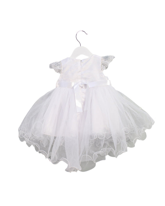 A White Sleeveless Dresses from Couché Tot in size 6-12M for girl. (Back View)