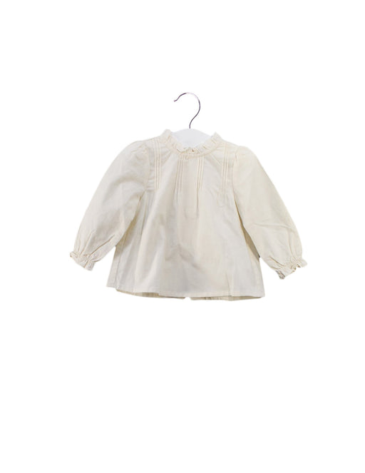 A Ivory Long Sleeve Tops from Louisiella in size 6-12M for girl. (Front View)