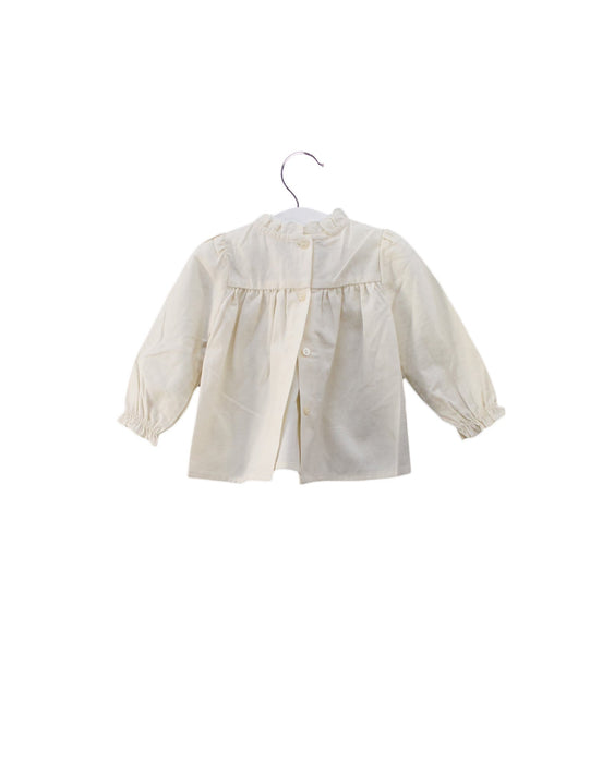 A Ivory Long Sleeve Tops from Louisiella in size 6-12M for girl. (Back View)
