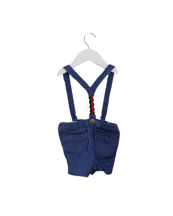 A Blue Overall Shorts from Nanos in size 6-12M for boy. (Back View)