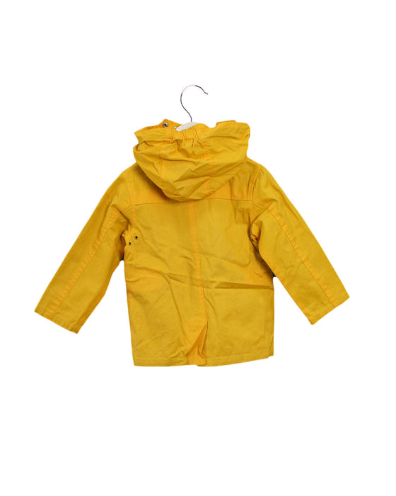A Yellow Lightweight Jackets from Jacadi in size 4T for girl. (Back View)