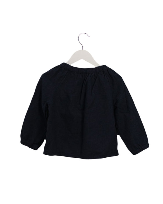 A Navy Long Sleeve Tops from Little Mercerie in size 5T for girl. (Back View)
