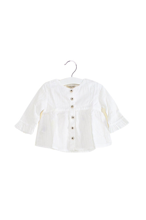 A White Long Sleeve Tops from 1 + in the family in size 0-3M for girl. (Front View)