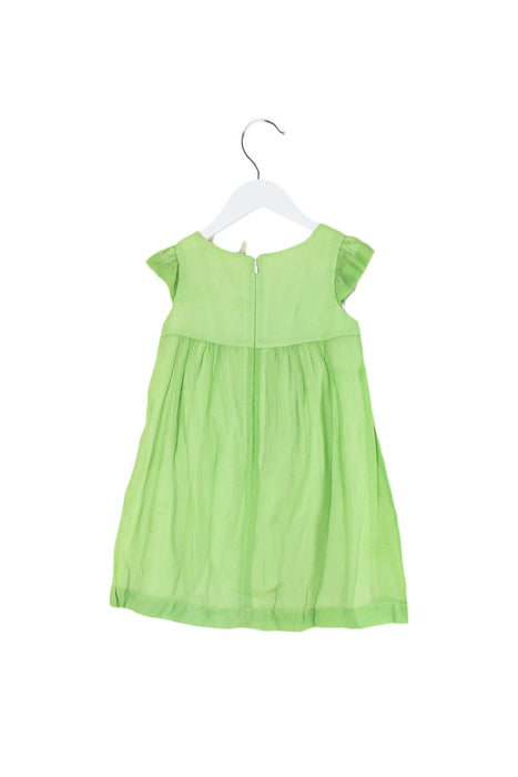 A Green Short Sleeve Dresses from Kingkow in size 6T for girl. (Back View)