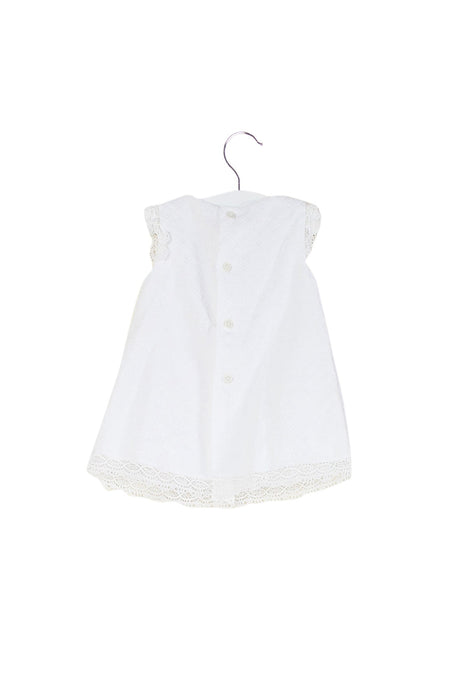 A White Sleeveless Dresses from Paz Rodriguez in size 3-6M for girl. (Back View)