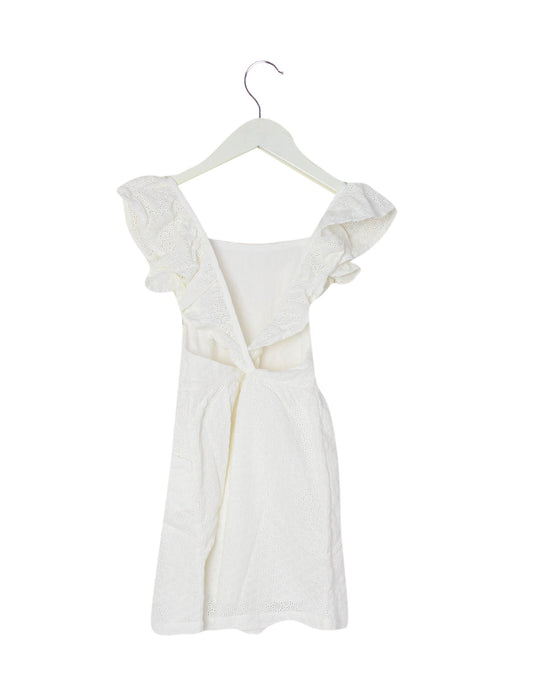 A White Sleeveless Dresses from Louise Misha in size 6T for girl. (Back View)