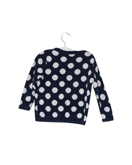 A White Beanies from Chicco in size 0-3M for girl. (Back View)