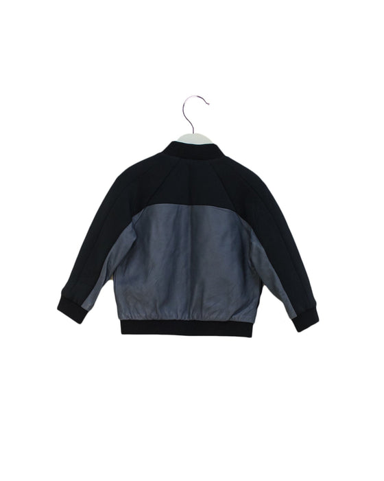 A Grey Lightweight Jackets from Dior in size 18-24M for boy. (Back View)