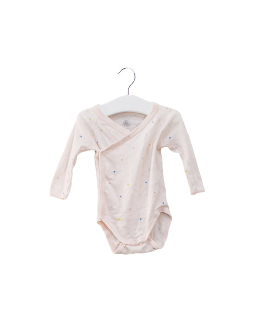 A Pink Long Sleeve Bodysuits from Petit Bateau in size 3-6M for girl. (Front View)