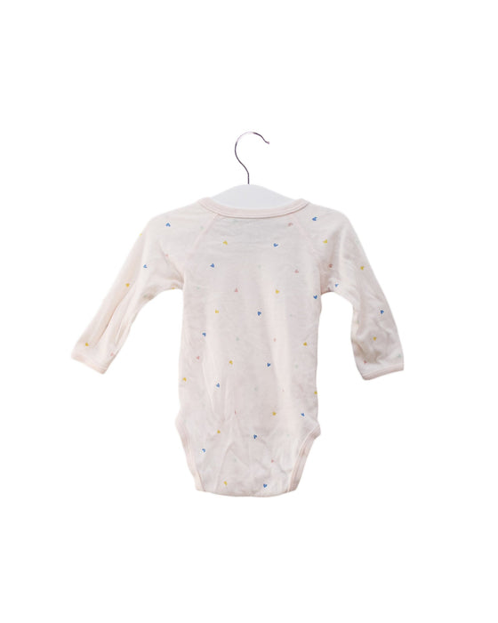 A Pink Long Sleeve Bodysuits from Petit Bateau in size 3-6M for girl. (Back View)