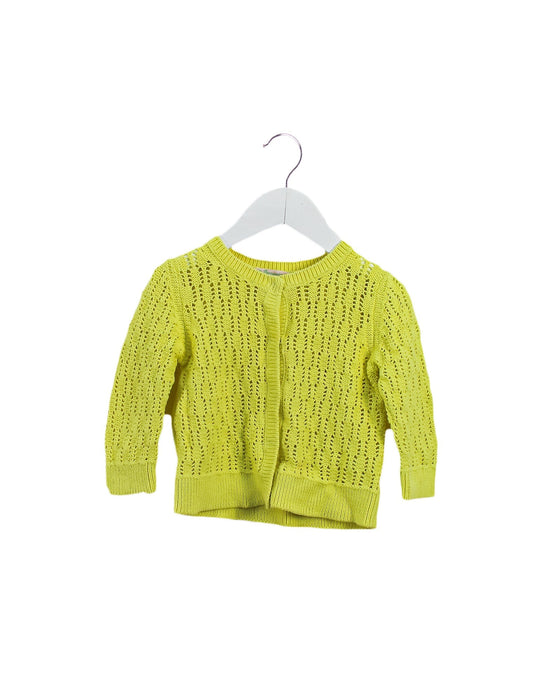 A Yellow Cardigans from Bonpoint in size 4T for girl. (Front View)