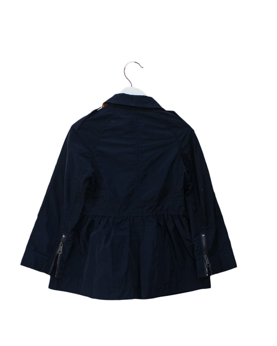 A Navy Coats from Burberry in size 5T for girl. (Back View)