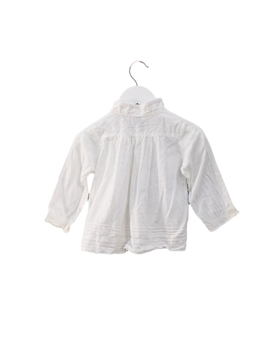 A White Shirts from DPAM in size 6-12M for girl. (Back View)