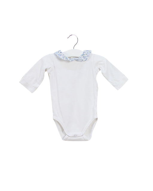 A White Long Sleeve Bodysuits from Jacadi in size 0-3M for girl. (Front View)