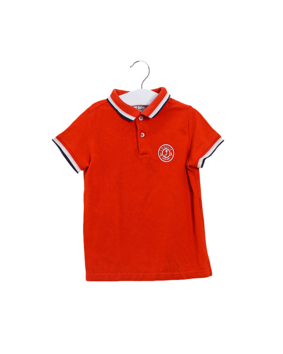 A Orange Short Sleeve Polos from Jacadi in size 4T for boy. (Front View)