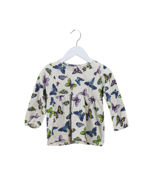 A Ivory Long Sleeve Tops from Tea in size 2T for girl. (Front View)