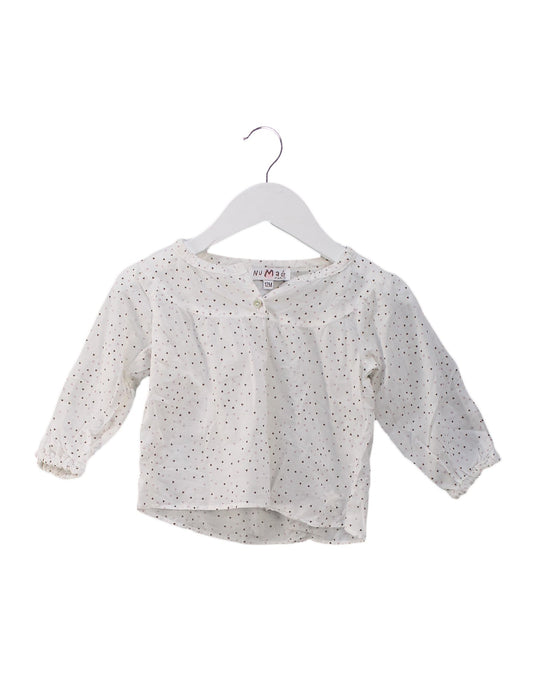 A White Long Sleeve Tops from Numae in size 6-12M for girl. (Front View)