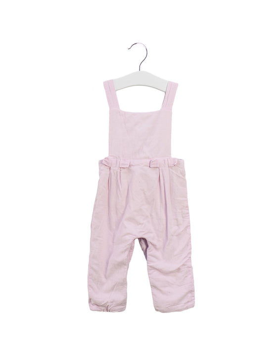 A Pink Long Overalls from Jacadi in size 6-12M for girl. (Front View)