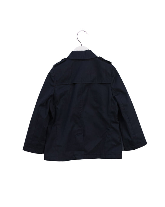 A Navy Coats from Aquascutum in size 4T for boy. (Back View)