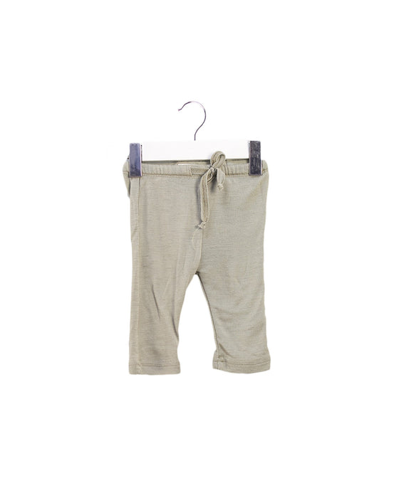 A Green Sweatpants from Nature Baby in size Newborn for neutral. (Front View)