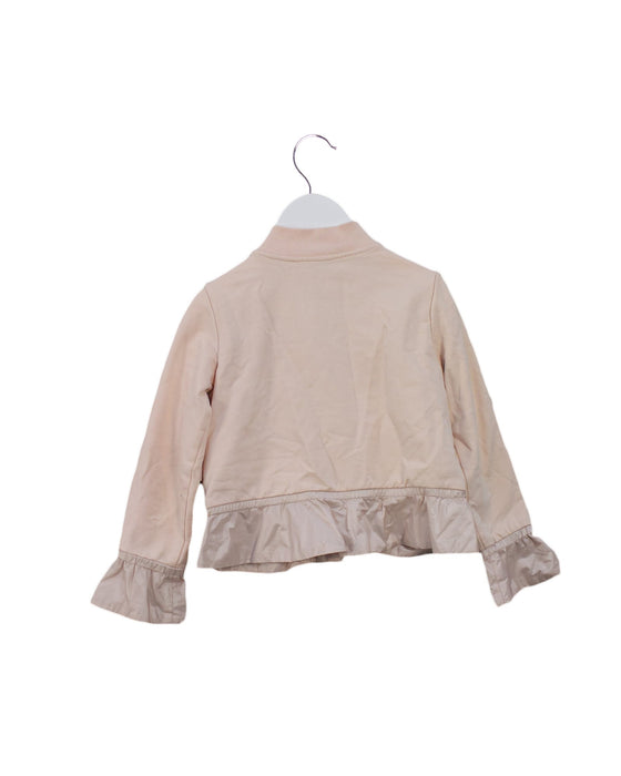 A Pink Lightweight Jackets from Moncler in size 4T for boy. (Back View)
