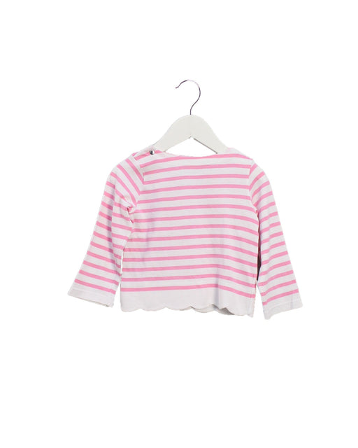 A Pink Long Sleeve Tops from Jacadi in size 2T for girl. (Front View)