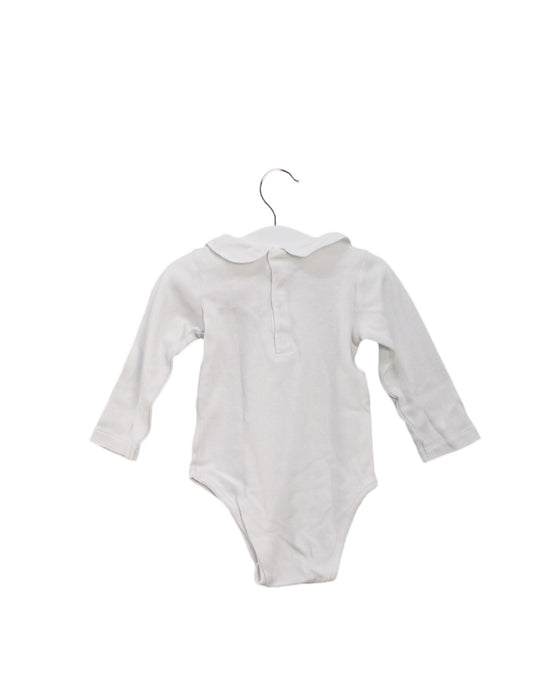 A White Long Sleeve Bodysuits from Jacadi in size 6-12M for girl. (Back View)