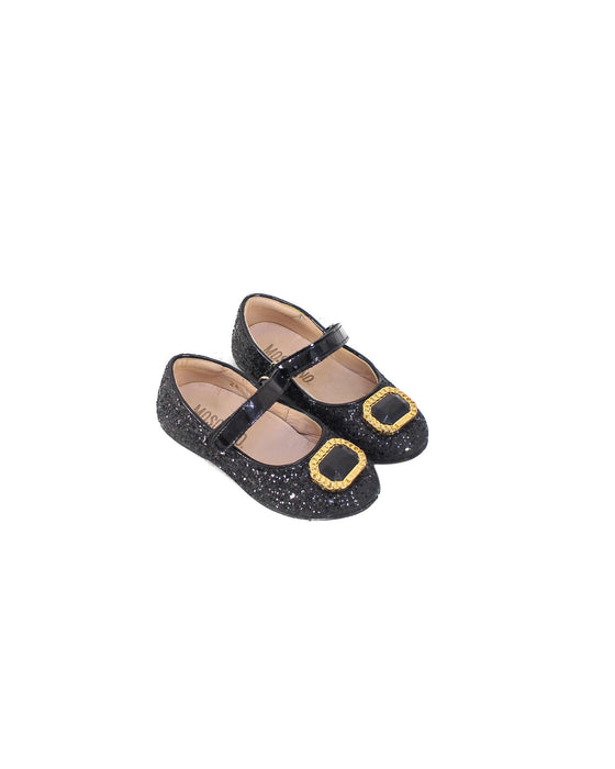 A Black Flats from Moschino in size 3T for girl. (Front View)