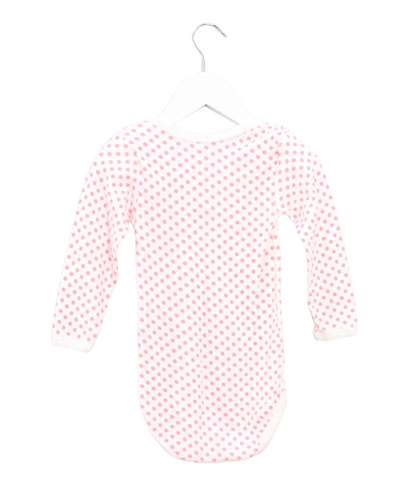 A Pink Long Sleeve Bodysuits from Petit Bateau in size 3T for girl. (Back View)