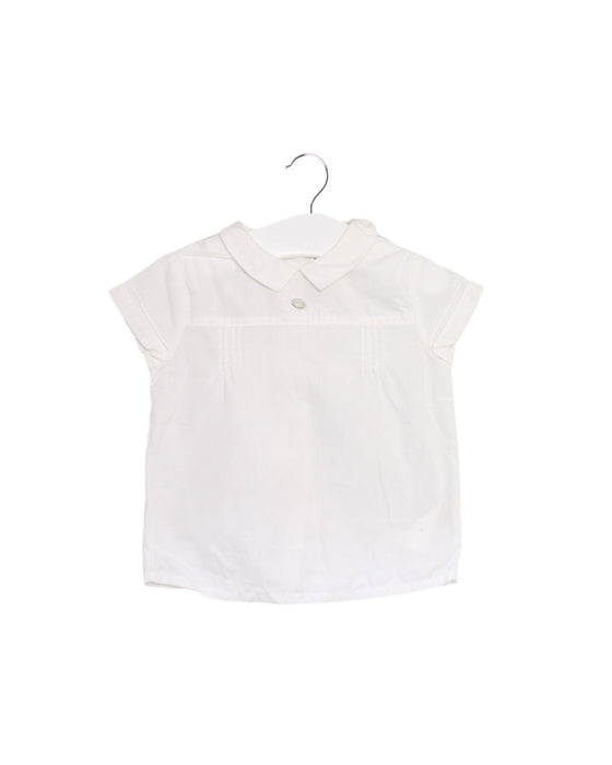 A White Short Sleeve Tops from Jacadi in size 3-6M for girl. (Front View)