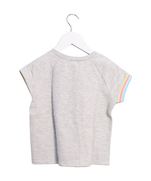 A Grey Short Sleeve Tops from Juicy Couture in size 6T for girl. (Back View)