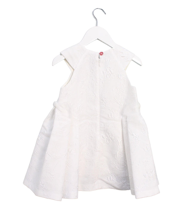 A White Sleeveless Dresses from Dior in size 18-24M for girl. (Back View)