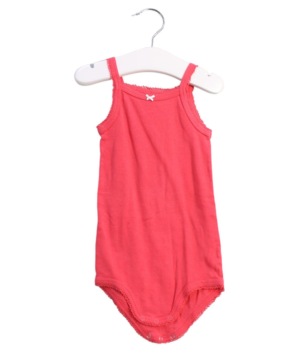 A Pink Sleeveless Bodysuits from Petit Bateau in size 12-18M for girl. (Front View)