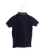 A Navy Short Sleeve Polos from Petit Bateau in size 5T for boy. (Back View)
