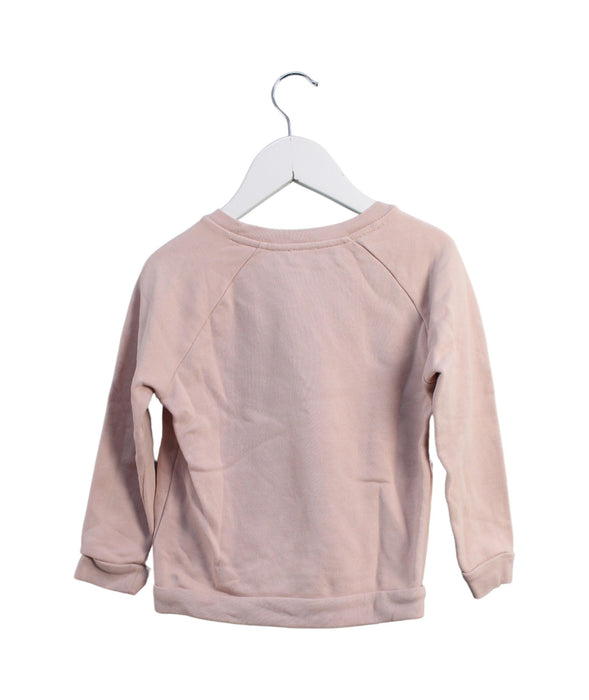 A Pink Crewneck Sweatshirts from COS in size 2T for girl. (Back View)