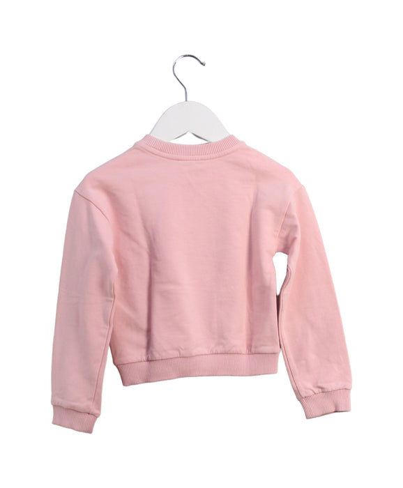 A Pink Crewneck Sweatshirts from Moschino in size 4T for girl. (Back View)