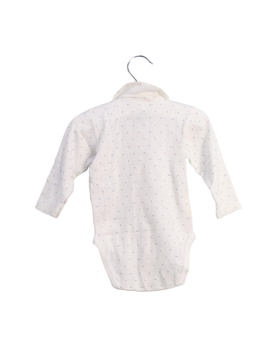 A White Long Sleeve Bodysuits from Petit Bateau in size 3-6M for girl. (Back View)