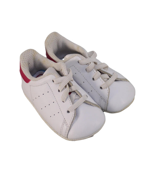 A White Booties from Adidas in size 3-6M for girl. (Front View)