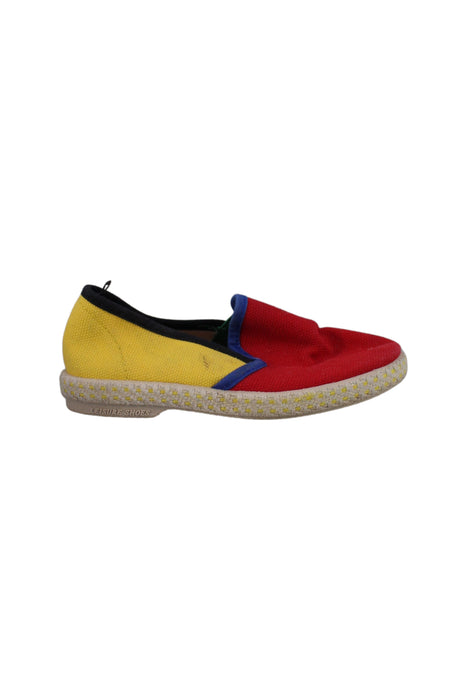 A Yellow Slip Ons from Rivieras in size 3T for girl. (Back View)