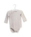 A Beige Long Sleeve Bodysuits from Petit Bateau in size 6-12M for boy. (Front View)