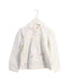 A Ivory Long Sleeve Tops from Jacadi in size 4T for girl. (Front View)