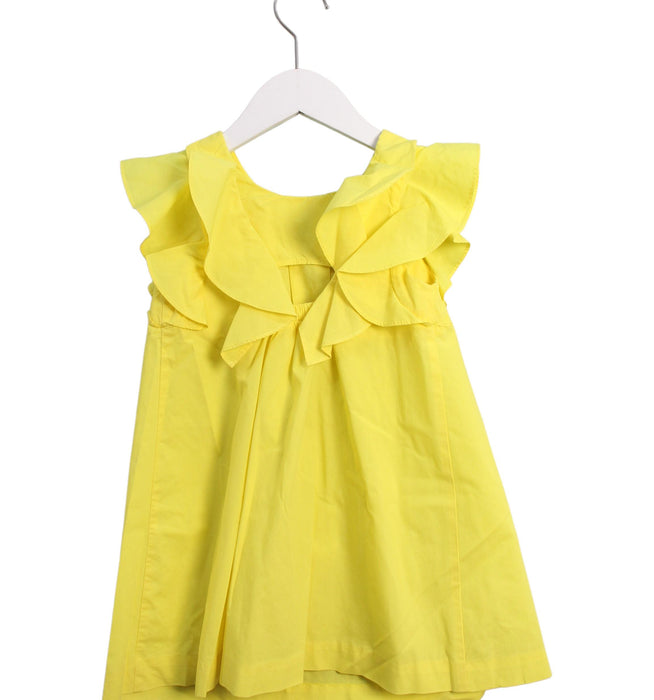 A Yellow Sleeveless Dresses from Jacadi in size 4T for girl. (Back View)
