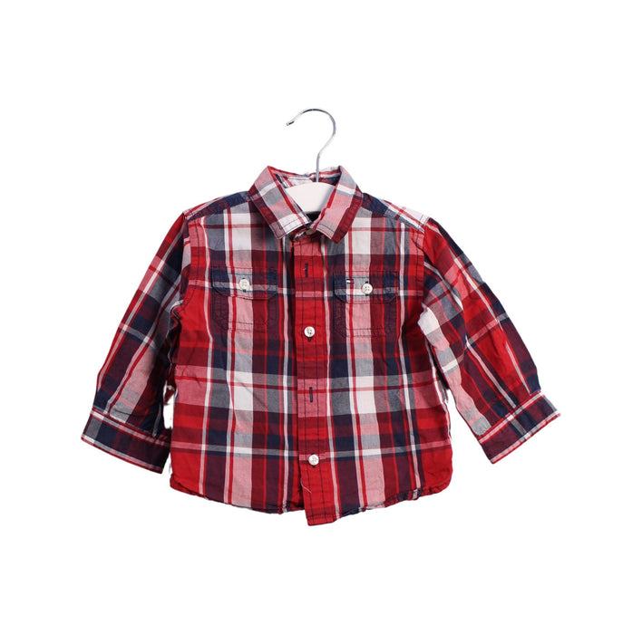 A Red Shirts from Tommy Hilfiger in size 6-12M for boy. (Front View)